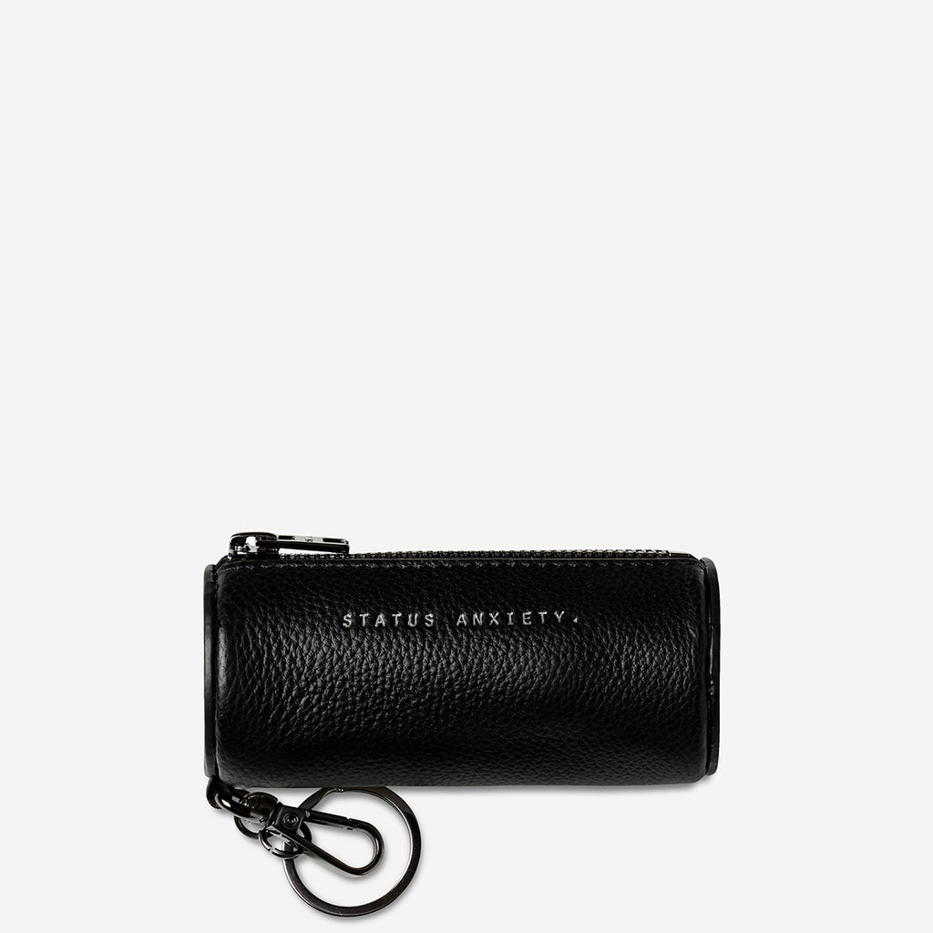 status-anxiety-keyring-escape-