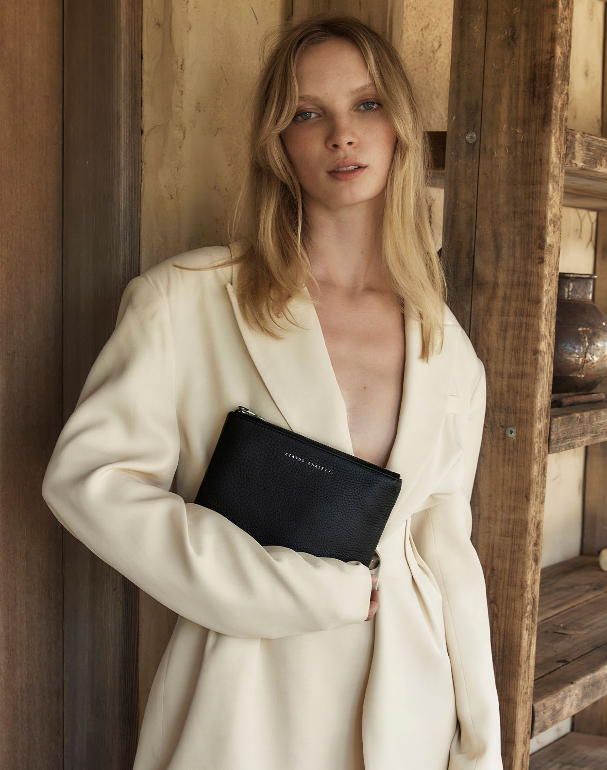 Status Anxiety Women's Leather Clutches