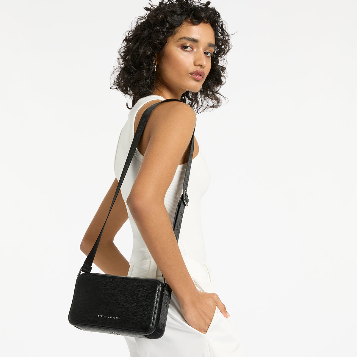 Delirium Women's Black Leather Crossbody Bag | Status Anxiety®