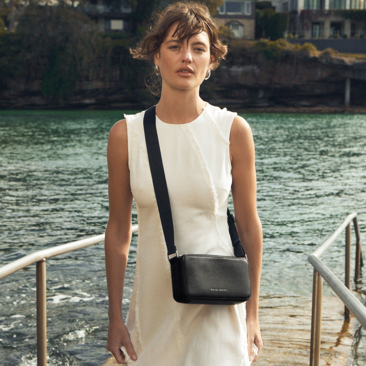 Delirium Women's Black Leather Crossbody Bag | Status Anxiety®